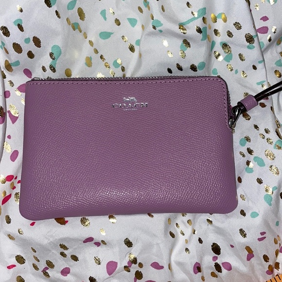 Coach Handbags - Coach lavender wristlet NWOT 6x4